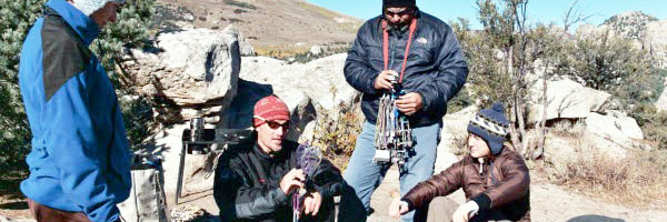 Group Climbing a Mountain 